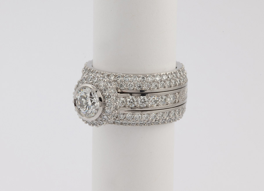 Platinum Round Diamond Engagement Ring With Tapered Diamond Bands