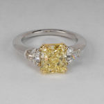 Platinum and Yellow Gold Fancy Yellow Diamond and Colorless Diamond Ring