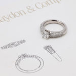 Platinum Round Diamond Engagement Ring with Two Diamond Bands
