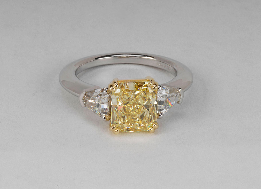 Platinum and Yellow Gold Fancy Yellow Diamond and Colorless Diamond Ring