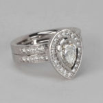 engagement ring with diamond shoulders