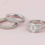 Platinum Emerald Cut Diamond Ring with Round Diamond Bands