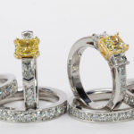 platinum and gold engagment rings with yellow diamond