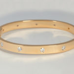 Heavy oval solid bangle can be made to fit various wrist sizes