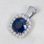 Platinum and Gold Cushion Shape Blue Sapphire and Diamond Pendant