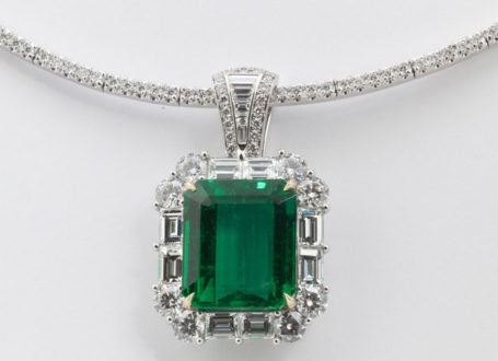 Platinum and Yellow Gold Emerald and Diamond Pendant on a White Gold Diamond Necklace