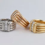 Platinum, Rose Gold, And Yellow Gold Ribbed Diamond Rings